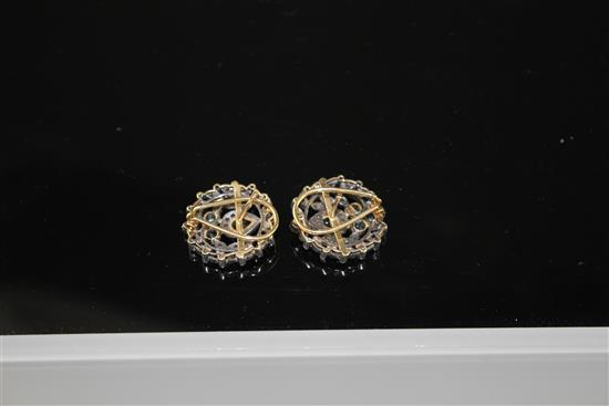 A pair of 20th century Indian style 18k yellow metal and 925 white metal, rose cut diamond and shaped sapphire set foliate earring,